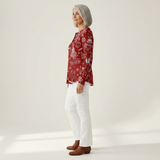 Charline - Pull de Noël rouge à motifs blancs