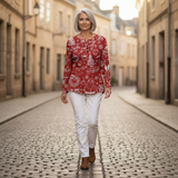 Charline - Pull de Noël rouge à motifs blancs