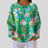 Éliane - Pull vert à fleurs folk