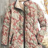 Iris - Veste matelassée rose poudré à motif botanique