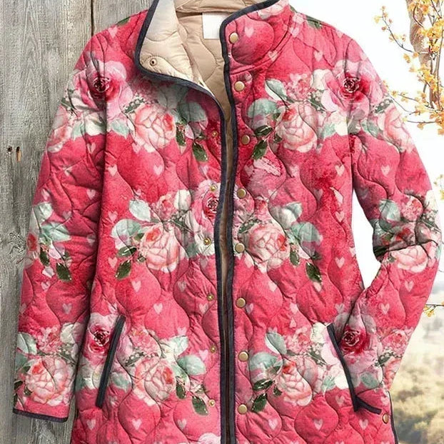 Aurore - Veste matelassée corail à motif de roses