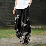Françoise – Pantalon large noir à motif de grues
