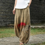 Madeleine – Pantalon large beige à motif discret
