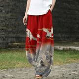 Édith – Pantalon large à motif d'oiseau rouge