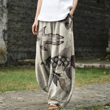 Hélène – Pantalon large beige à motif de poissons
