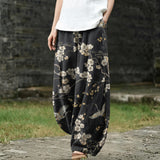 Ghislaine – Pantalon large noir à motif d'oiseaux