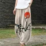 Léonie – Pantalon large beige à motif de soleil à l'encre