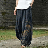 Capucine – Pantalon large bleu foncé à motif de soleil