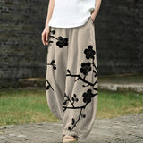 Céleste – Pantalon large beige à motifs floraux