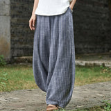 Anne-Marie – Pantalon large gris à rayures